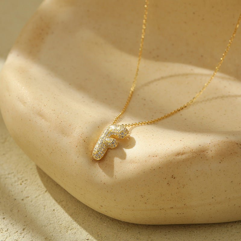 Collier Lettres Bubble en Acier Inoxydable – Élégance et Modernité - 𝓑𝓲𝓳𝓸𝓾𝔁𝓒𝓪𝓮𝓵𝔂𝓼 - Collier - 𝓑𝓲𝓳𝓸𝓾𝔁𝓒𝓪𝓮𝓵𝔂𝓼 -