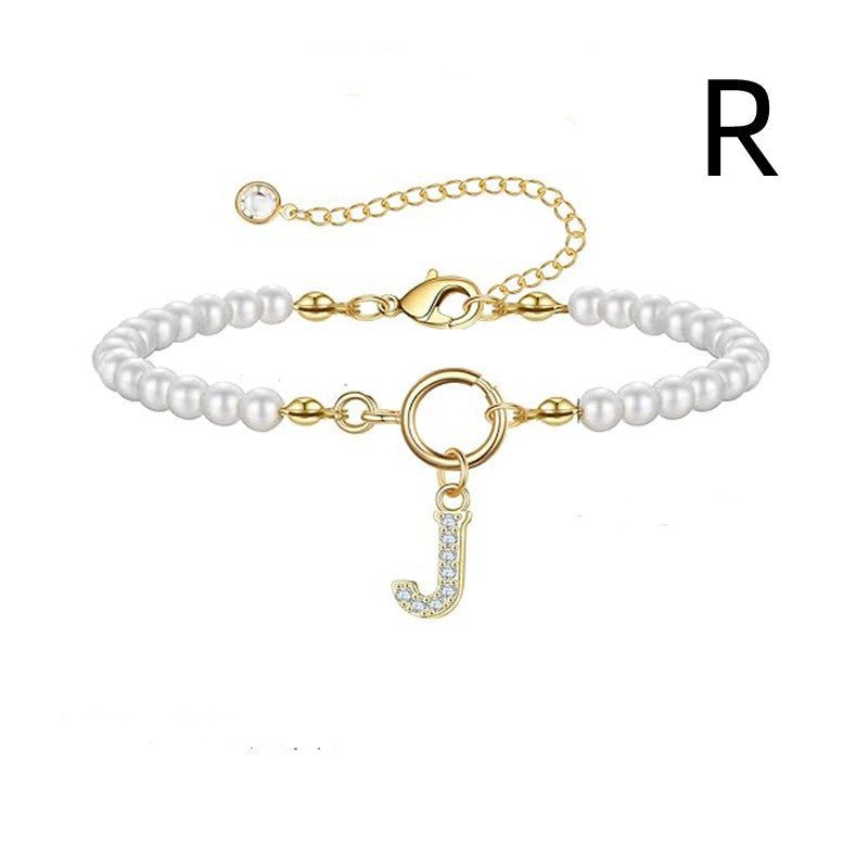 Bracelet initial – Perles 6 mm et pendentif lettre A - Z - 𝓑𝓲𝓳𝓸𝓾𝔁𝓒𝓪𝓮𝓵𝔂𝓼 - bracelet - 𝓑𝓲𝓳𝓸𝓾𝔁𝓒𝓪𝓮𝓵𝔂𝓼 - 